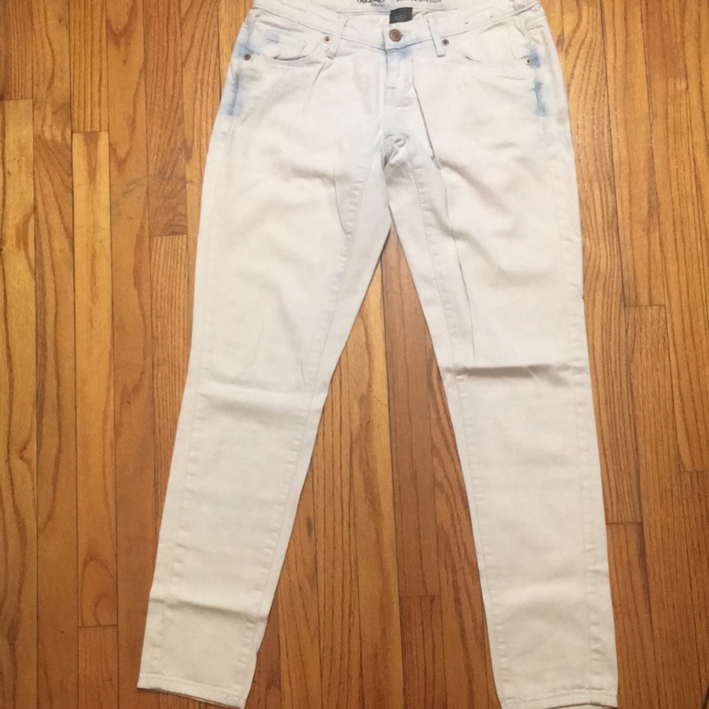 Bleached white light wash low rise skinny jeans